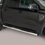 Load image into Gallery viewer, A black pickup truck shown from the side, featuring a long silver chrome side step running along the lower door.
