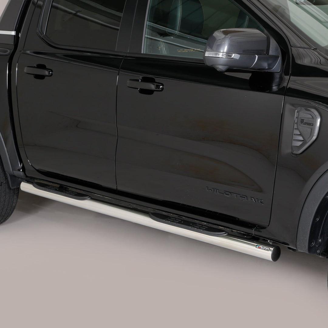 A black pickup truck shown from the side, featuring a long silver chrome side step running along the lower door.
