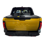 Load image into Gallery viewer, Yellow truck with a black tonneau cover, roller shutter