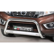A silver chrome bull bar front bumper guard installed on the front of a brown Nissan Xterra 4x4 truck, shown against a neutral studio background.