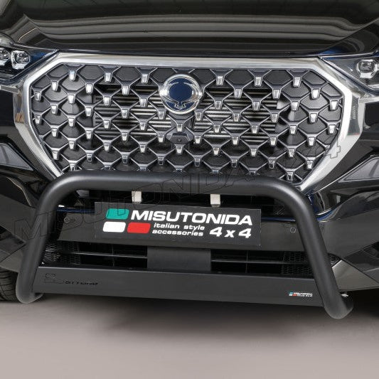 Black Misutonida 4x4 front bumper guard installed on the front bumper of a black SUV, shown against a neutral gray studio background.