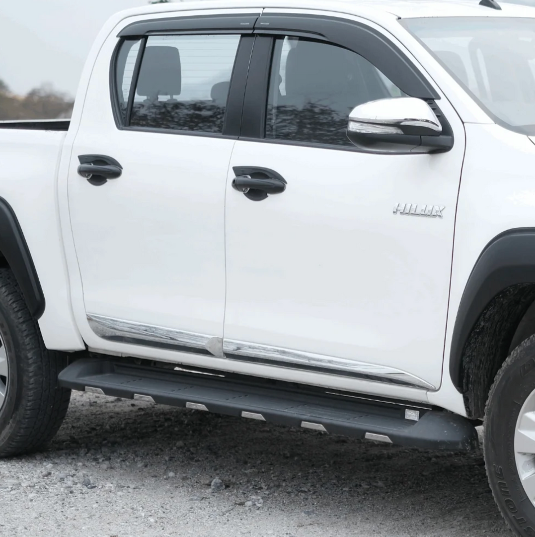 Toyota Hilux side steps with chrome accent