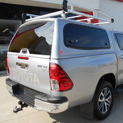Toyota Hilux Sammitr V2 Steel Canopy in Red Metallic 3T6 with sliding glass and roof rails