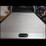 Load image into Gallery viewer, Toyota Hilux roller shutter original equipment silver